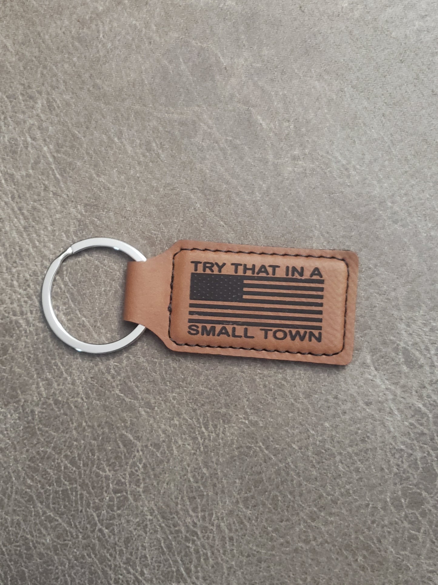 Try that in a small town koozie or keychain