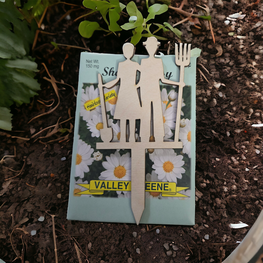 Farmer and wife pitchfork flower plant stake