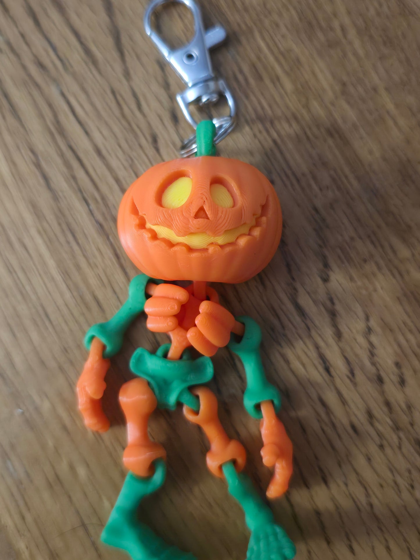 3D printed articulated Halloween pumpkin skeleton keychains