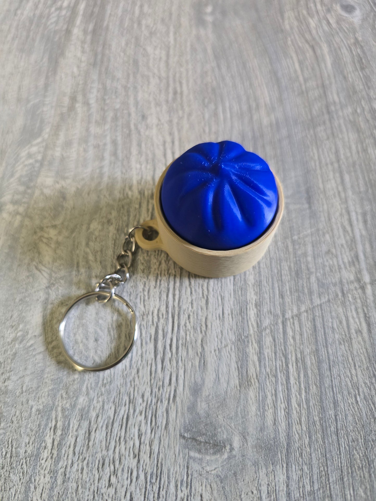 3D printed dumpling fidget clicker keychain